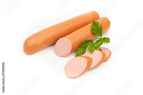 Photography Raw sausages lie in a group on a white background and are decorated with parsley leaves