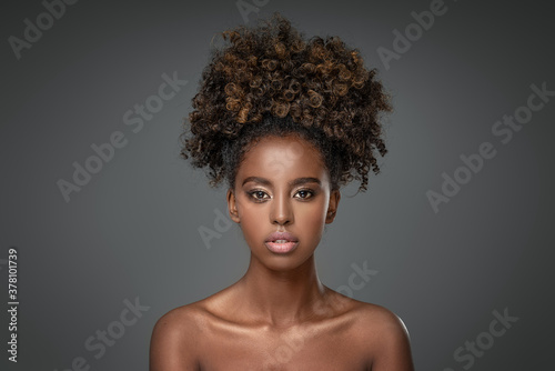Beauty portrait of woman with afro photo