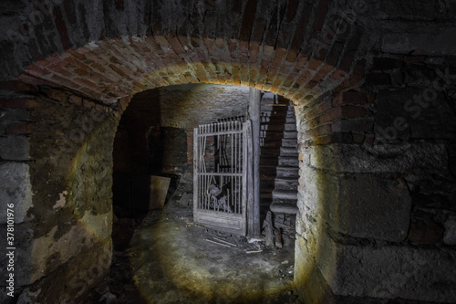 Fototapeta Naklejka Na Ścianę i Meble -  dark vault in a cellar from a castle