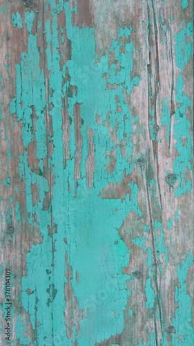 An old, shabby tree with cracks, stains of peeling paint. Wooden boards covered with old peeling paint. Stock photo for web and print, background, wallpaper, with empty space for text and design.