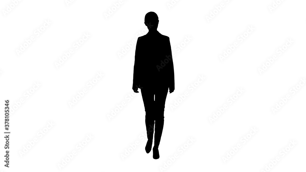 Silhouette Confident Businesswoman walking towards looking at ca Silhouette Confident Businesswoman walking towards looking at ca