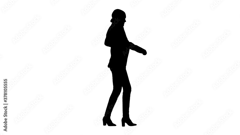 Silhouette Smiling young business woman doing a cheerful walk.