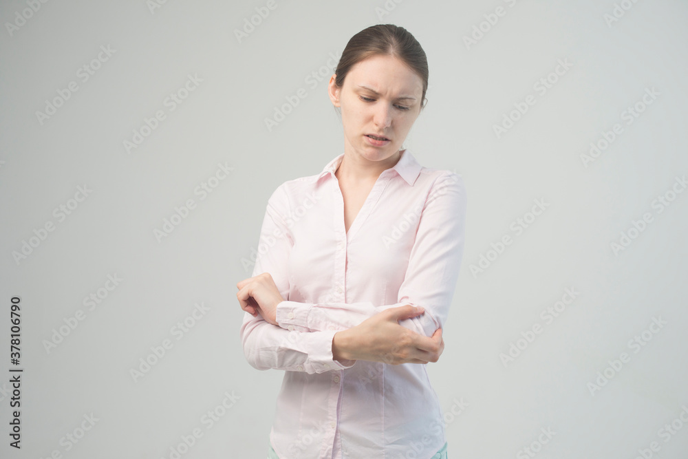 Tired woman feeling pain, massaging tense muscles Tired woman feeling pain, massaging tense muscles