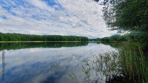 Fototapeta Naklejka Na Ścianę i Meble -  Clouds reflecting in the lake