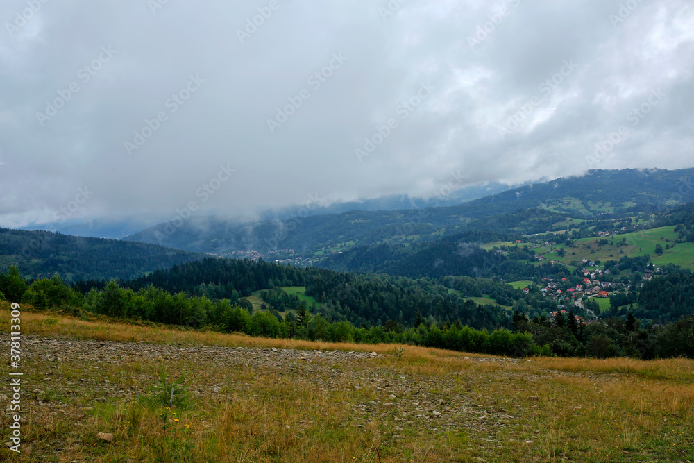 foggy morning in Korbielow, tourist village in the mountains in Poland