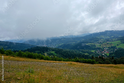 Fototapeta Naklejka Na Ścianę i Meble -  foggy morning in Korbielow, tourist village in the mountains in Poland