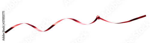 A thin curly red ribbon for Christmas and birthday present banner isolated against a white background.