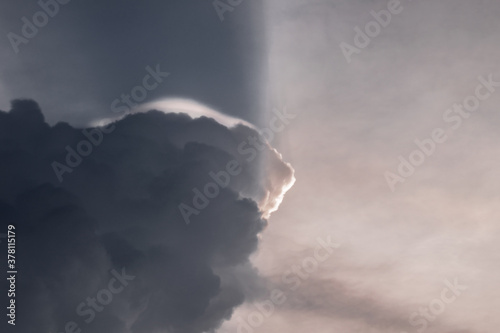 A set of images of clouds taken during a storm and sunset in rural india