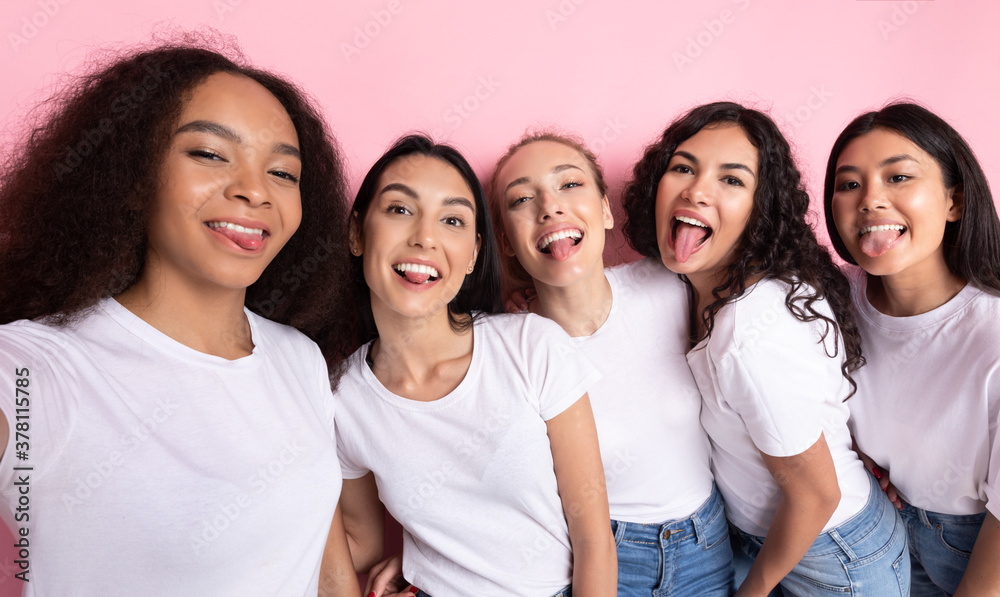 Multicultural Ladies Making Group Selfie Showing Tongues Over Pink Background Multicultural Ladies Making Group Selfie Showing Tongues Over Pink Background