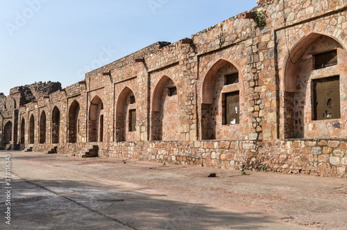 A mesmerizing view of architecture of small tomb at old fort from side lawn.