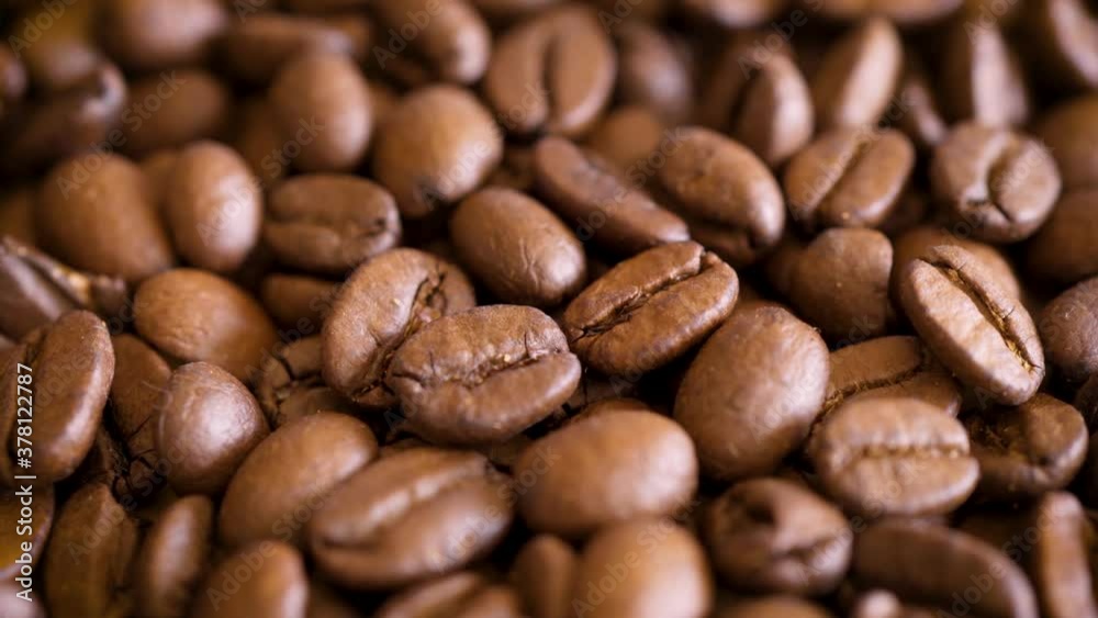 close-up on fragrant brown roasted coffee beans close-up on fragrant brown roasted coffee beans