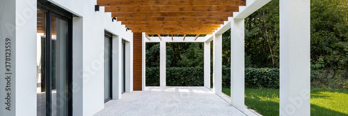 Modern house veranda and garden, panorama photo