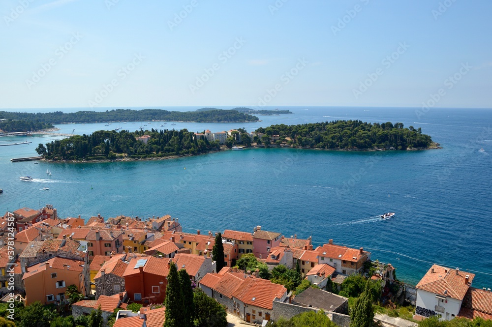 panoramic view of Rovinj Croatia old town with blue sea and Red island 
