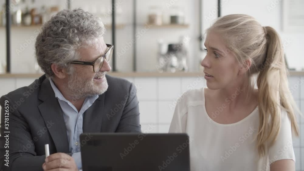 Professional senior manager discussing project and holding contract with customer. Focused successful businesswomen listening, meeting and signing agreement. Business and partnership concept Professional senior manager discussing project and holding contract with customer. Focused successful businesswomen listening, meeting and signing agreement. Business and partnership concept