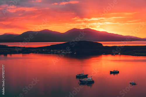Fototapeta Naklejka Na Ścianę i Meble -  sunset over Oban, Isle of Kererra, and Isle of Mull