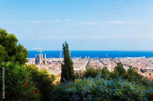 Barcelona, Catalonia, Spain, September 21, 2019. The view of Barcelona from the Park of Guell was designed by the architect Antoni Gaudi. photo