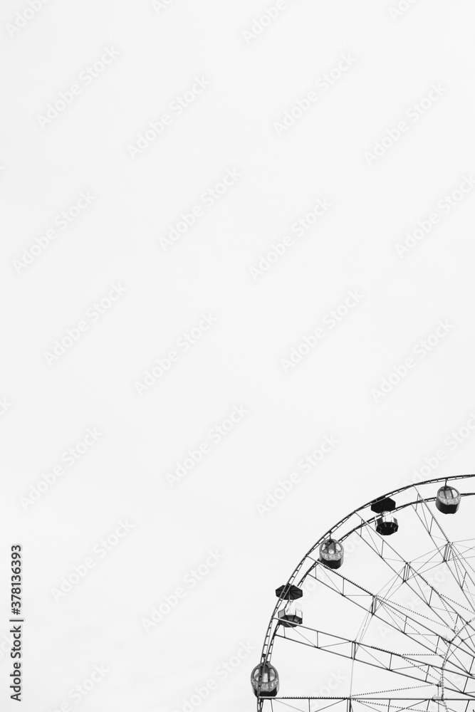 Urban geometry, modern architecture, Abstract and Inspirational architectural design. Ferris wheel in an amusement Park. Monochrome photography