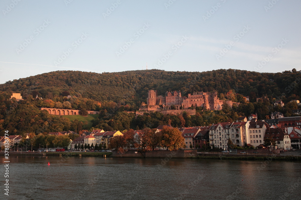 Obraz premium View of Heidelberg old town and Castle with the river Neckar during sunset in autumn in Heidelberg, Germany