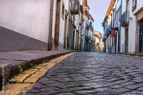 Ground Level Cobblestone Narrow European Village Street, Braga, Portugal