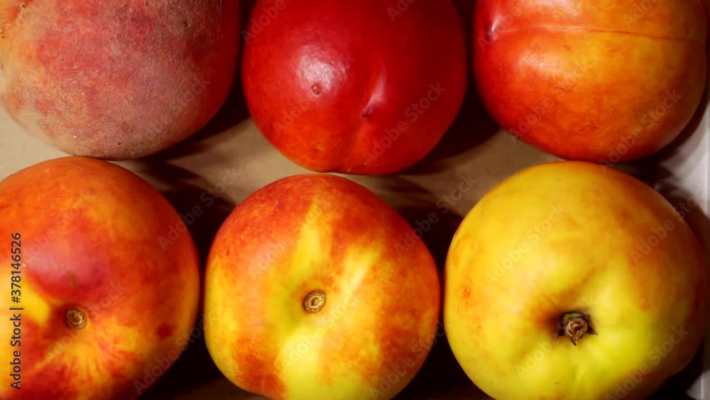 harvesting and storage of fruits.peaches in a carton box.top view. harvesting and storage of fruits.peaches in a carton box.top view.