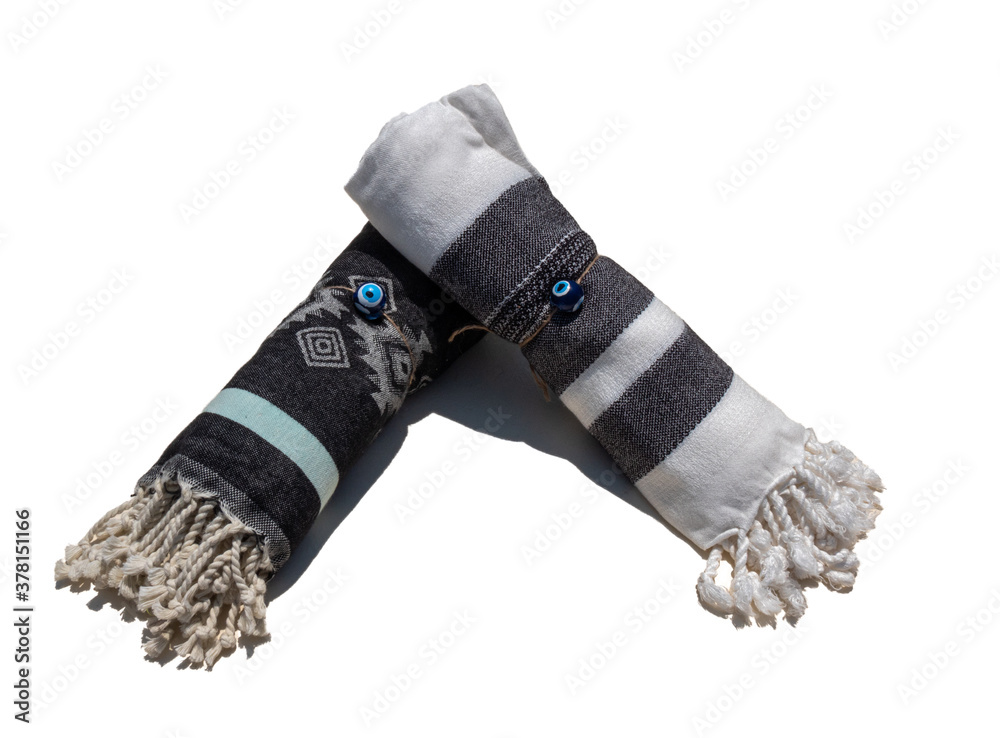 Two rolled Turkish towels isolated on white background. Two rolled Turkish towels isolated on white background.