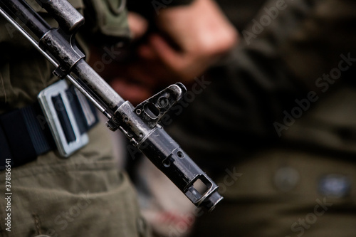 A soldier's Kalashnikov assault rifle, fighting, anti-terror, Special forces team. Russian police (Spetsnaz). photo