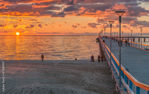 Colorful sunset near a marine pier at the Baltic Sea tourist resort   Europe