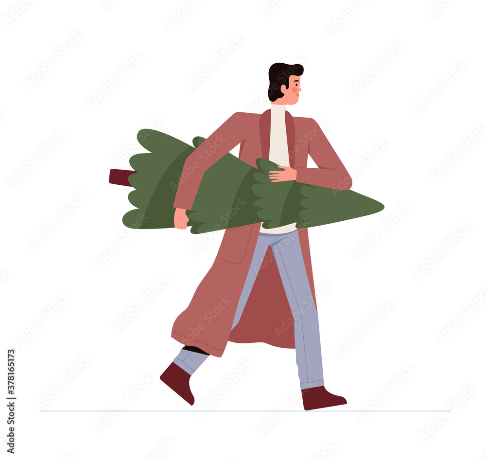 Young man in a coat carries a lovely Christmas tree home to his family. Christmas celebration concept