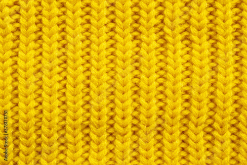 Yellow knitting wool texture background