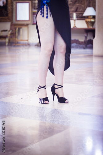 Legs of sexy woman tango dancer in pose