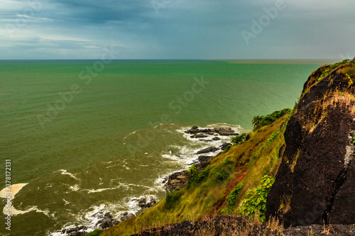 mountain cliff view with sea shore at morning