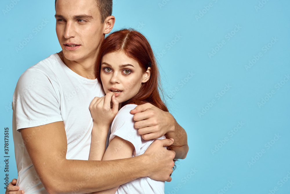 Portrait of man and woman on blue background Copy Space cropped view love family trust Portrait of man and woman on blue background Copy Space cropped view love family trust
