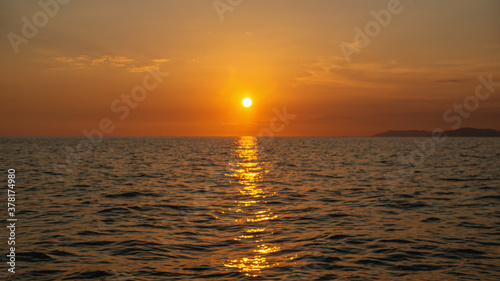 Beautiful abstract unfocused sunset over the sea. Blurry background for the screen saver. beautiful Wallpaper.