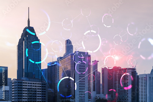 Photography Hologram of abstract technology glowing icons, panoramic cityscape of Kuala Lumpur at sunset, Malaysia, Asia