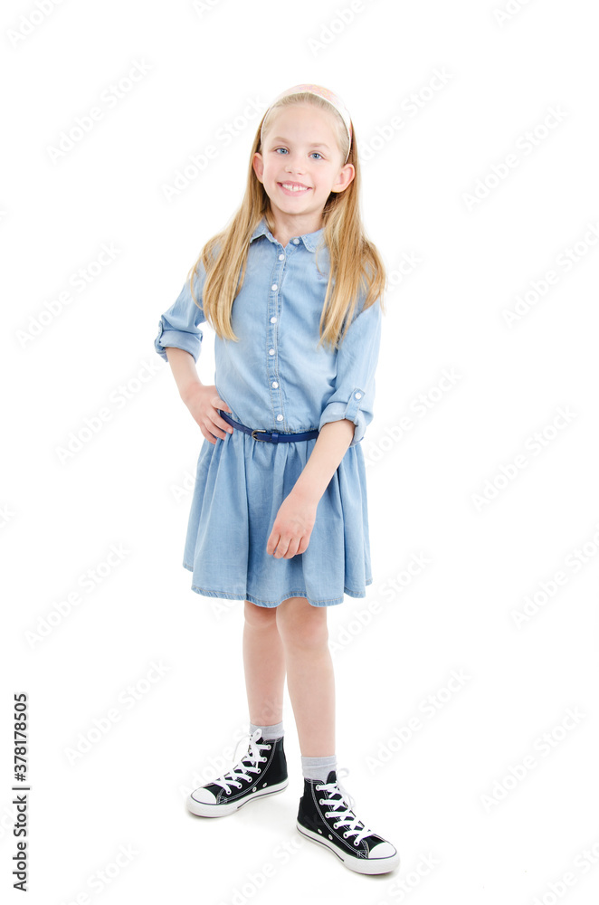 Full length image of a pretty little girl, posing. Isolated on white background Full length image of a pretty little girl, posing. Isolated on white background