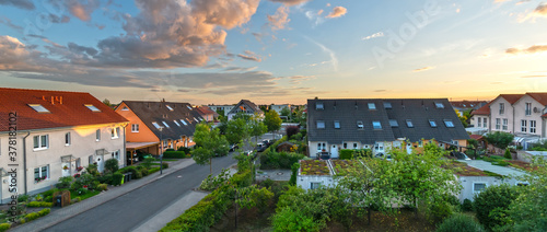 street with new, modern homes in a suburb of germany photo