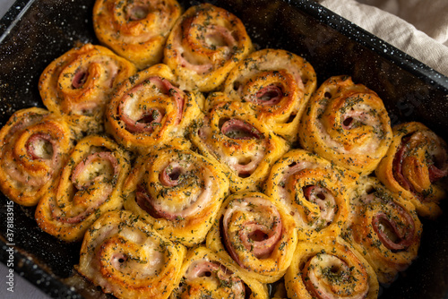 Ham and Swiss roll-ups pinwheels, Puff pastry rolls with ham and cheese 