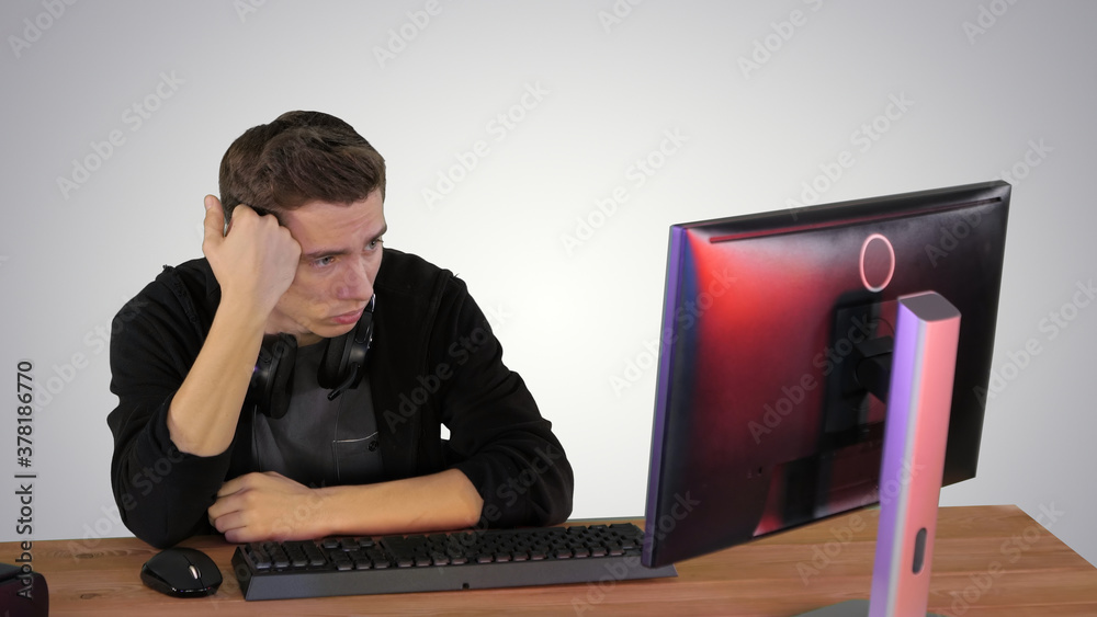 Upset gamer expressing disappointment watching online game on gr Upset gamer expressing disappointment watching online game on gr