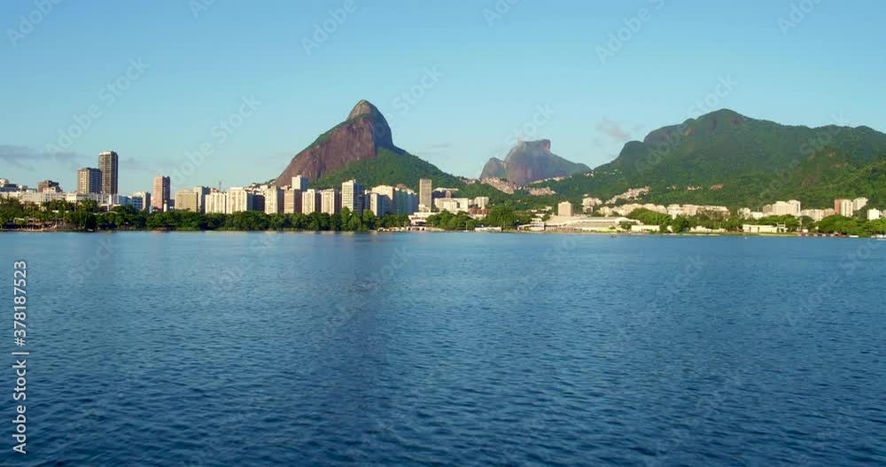 Low angle aerial toward Leblon cityscape, Rio, over Rodrigo de Freitas lagoon Low angle aerial toward Leblon cityscape, Rio, over Rodrigo de Freitas lagoon