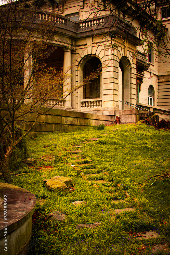 Stepping Stones Leading Up to An Etrance to an Ornamental Stone Mansion