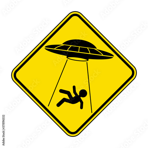 UFO abducts human from earth. Vector illustration of yellow diamond shaped warning road sign with alien abducts man. Caution alien invasion in unidentified spaceship. Humorous traffic sign.
