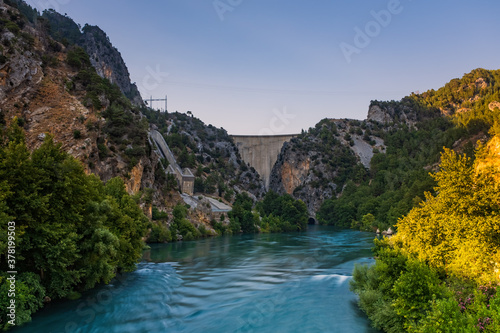 Side, Turkey, July 2020: Dam on the Manavgat river near the city of Side in Turkey. Long exposure picture.