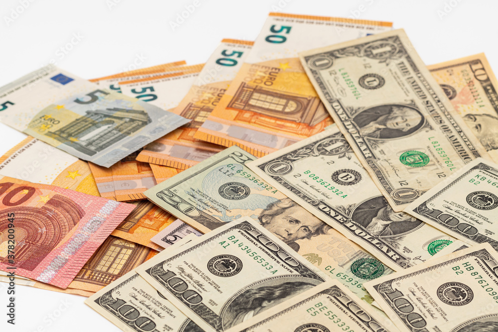 Euros and dollars mixed on white background Euros and dollars mixed on white background