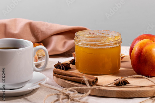 a ceramic cup of coffee and honey treats