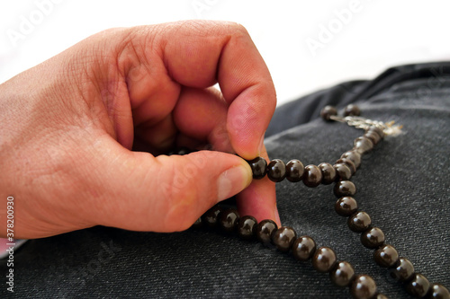 To worship with a hand, hand and rosary with a close-up rosary,