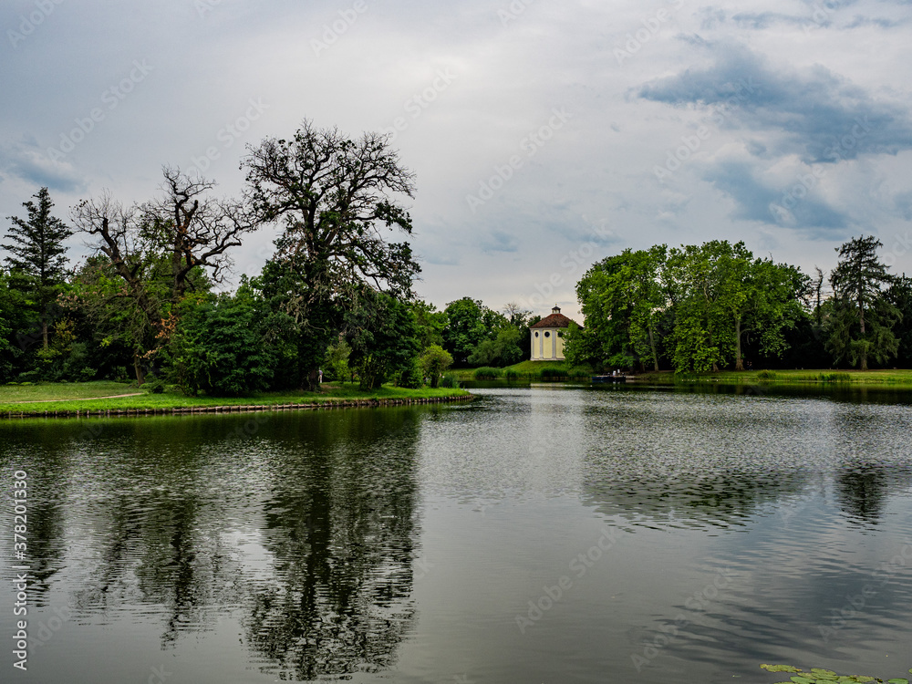 Fototapeta premium Gartenreich, Wörlitz, Germany, 27 July 2020. Idyllic landscape of formal gardens, trees, lakes and lawns in the Eastern part of Germany. Unesco world heritage site.