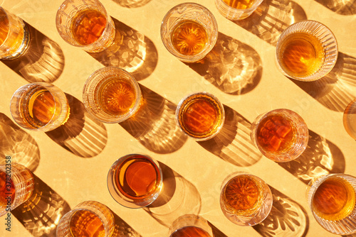 Cups with alcohol beverage in bar