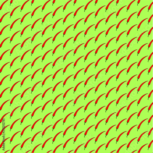Red cayenne chili peppers diagonal pattern green background