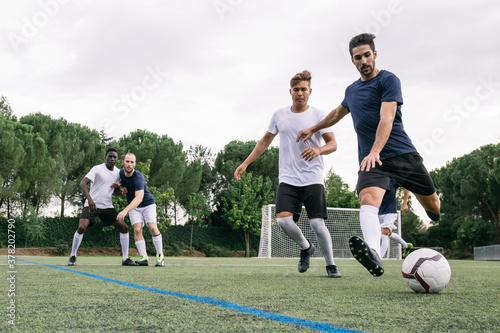 Men playing soccer
