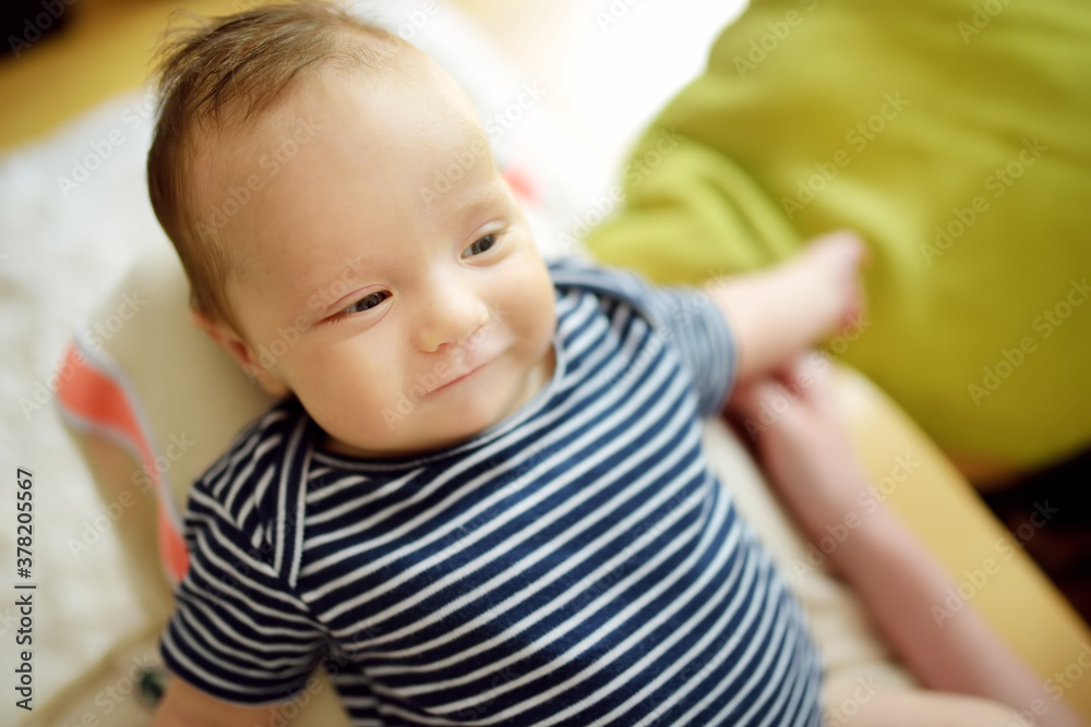 Cute three months old baby boy playing with his mommy. Cute three months old baby boy playing with his mommy.